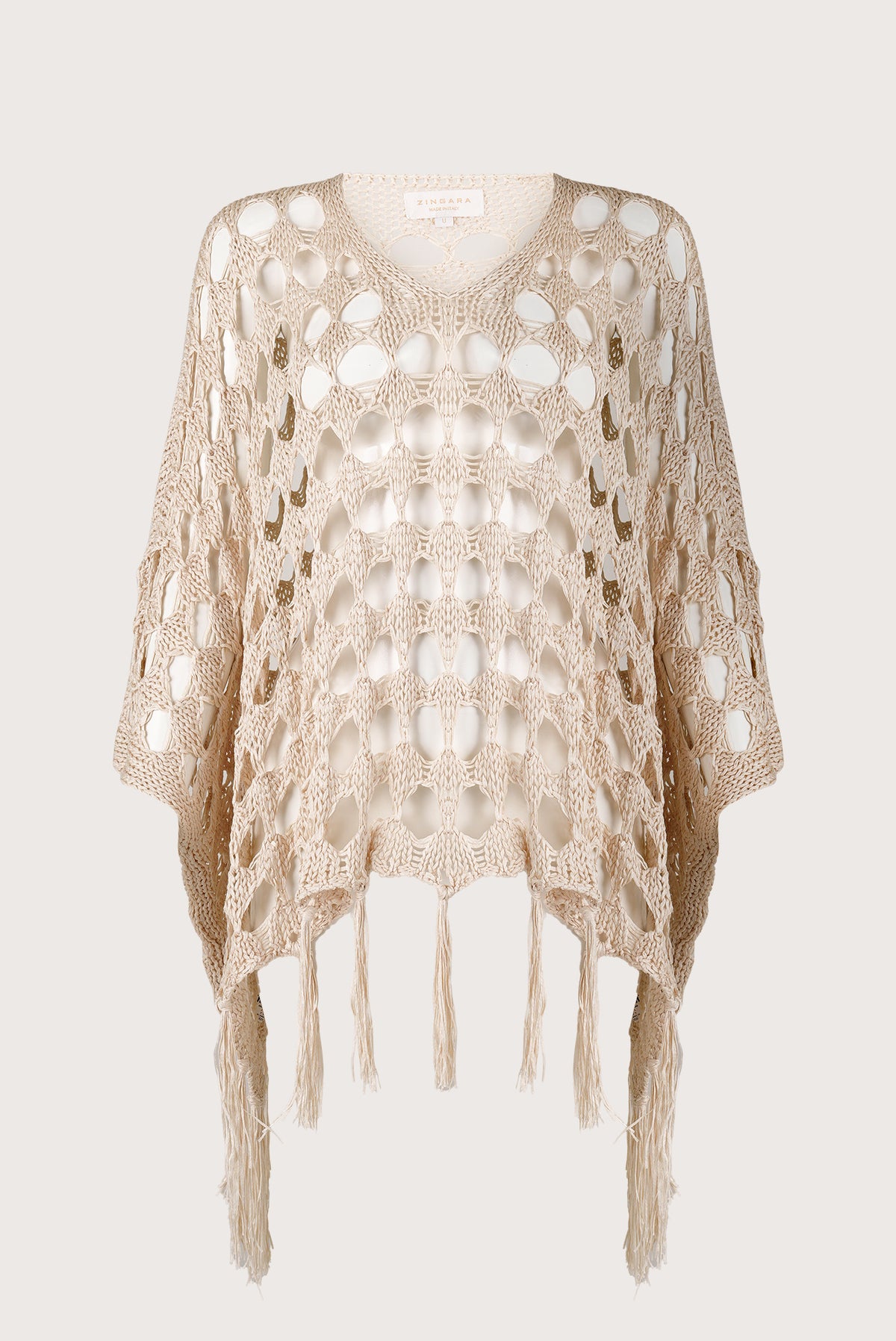 Poncho flecos amira crema